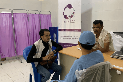 Accept International staff providing support